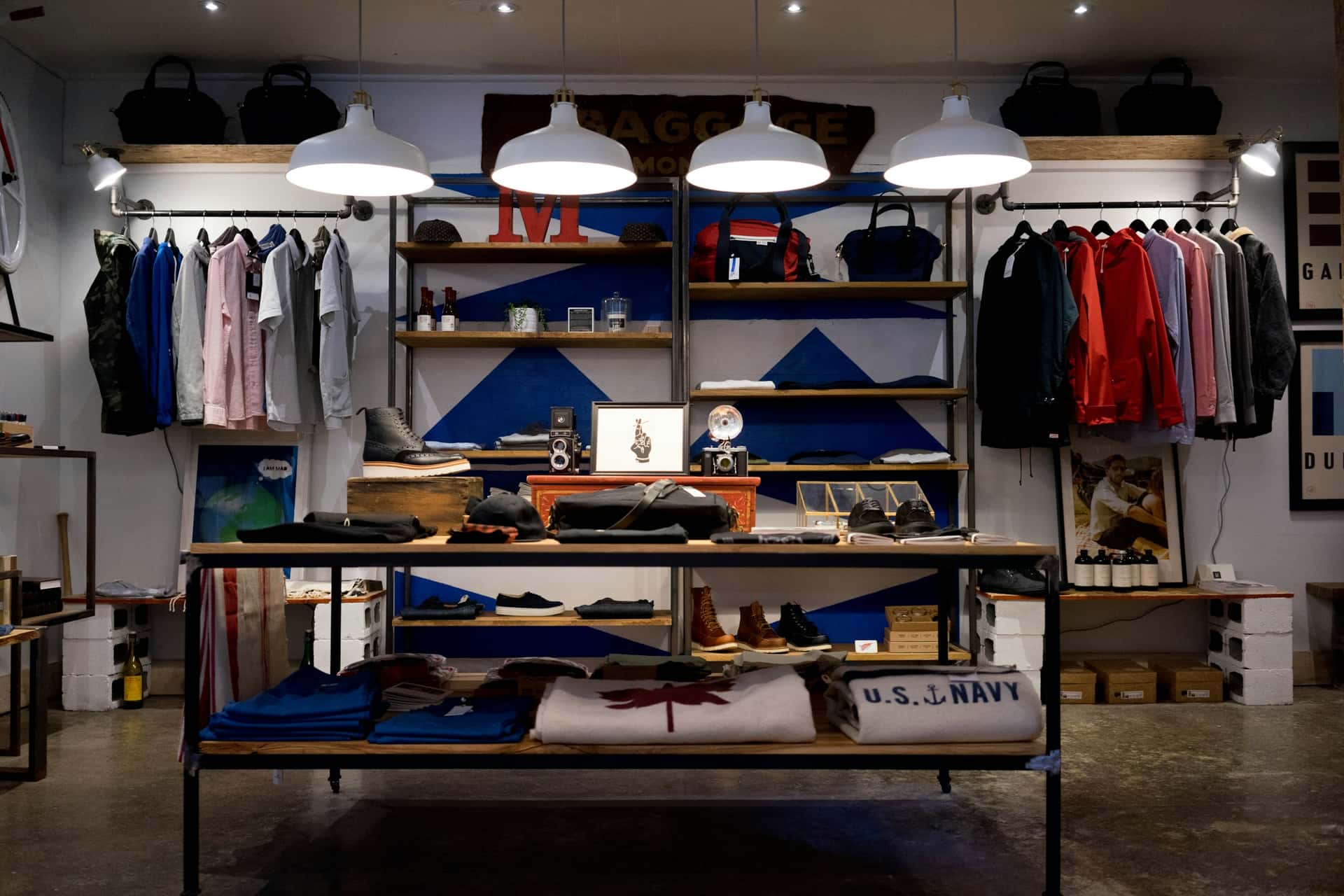 A modern retail store interior with lit shelving.