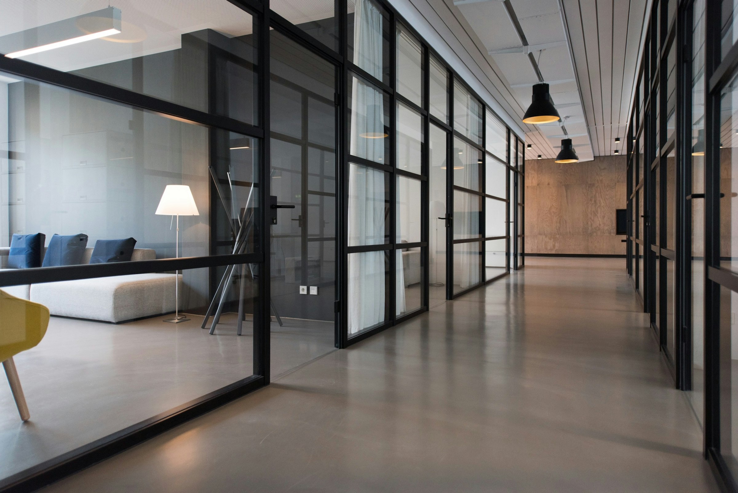 Stylized meeting room with a long table and a growth chart on the wall.