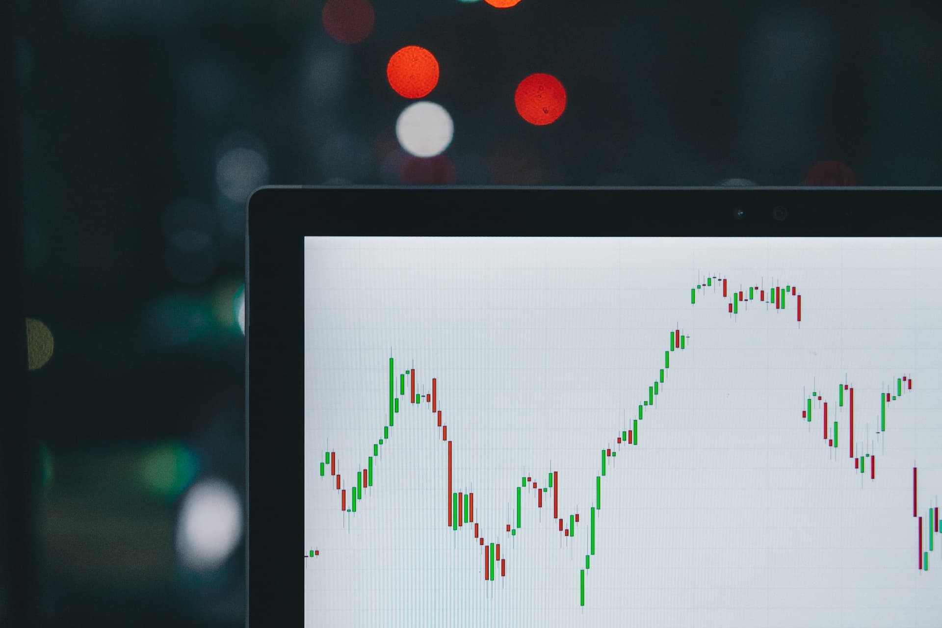 A candlestick market chart on a trading screen.